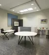 Круглый конференц-стол КС-190 белый в шоуруме офисной мебели, вид в зале.