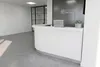 Стойка администратора РИ-211 в интерьере медицинской клиники Хадасса, белый цвет.