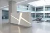 Стойка ресепшн РИ-215 в атриуме бизнес-центра, белый акриловый камень с LED.