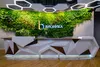 Стойка ресепшн РИ-199 с 3D-фасадом из композита и камня на 4 места
