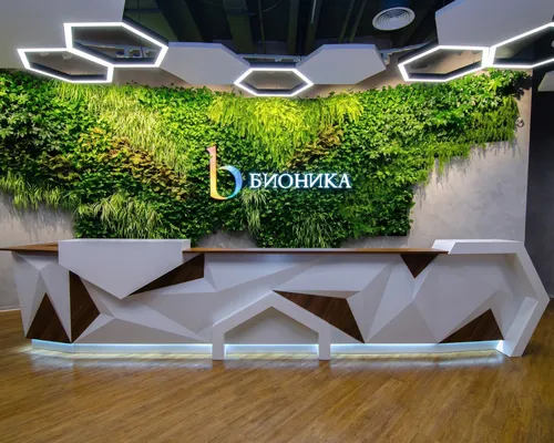 Стойка ресепшн РИ-199 с 3D-фасадом из композита и камня на 4 места