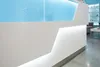 Детальный вид фасада РИ-207 с материалами KERROCK и голубым стеклом