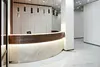 Стойка ресепшн РИ-218 с активированной LED-подсветкой цоколя из камня
