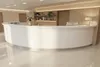 Фронтальный вид стойки ресепшн РИ-225 с гостевой столешницей из камня