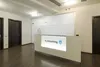 Ресепшн Хибины белый с логотипом компании на лицевом фасаде, общий вид.